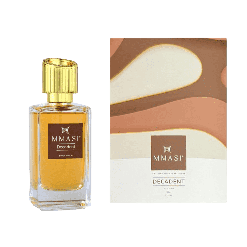 A clear glass bottle filled with golden-yellow liquid next to its packaging box with a beige and brown abstract design, both labeled "MMASI Decadent" in white lettering.