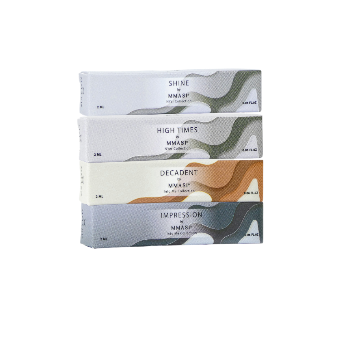 Stack of four perfume boxes with modern design, labeled "Shine", "High Times", “Impression” and "Decadent" from MMASI brand collections.