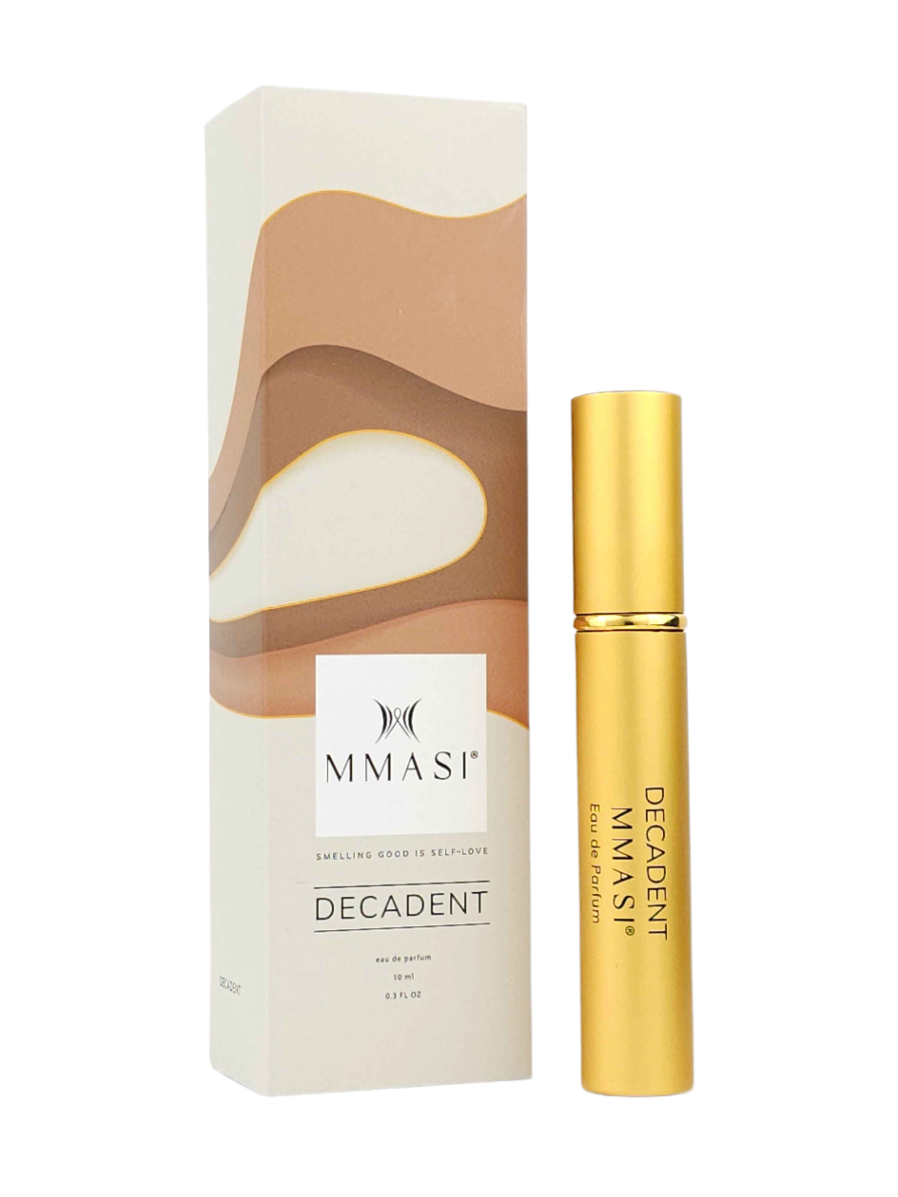 A gold cylindrical bottle of 'DECADENT MMASI Eau de Parfum' next to its beige and brown packaging box with the text 'SMELLING GOOD IS SELF-LOVE'.