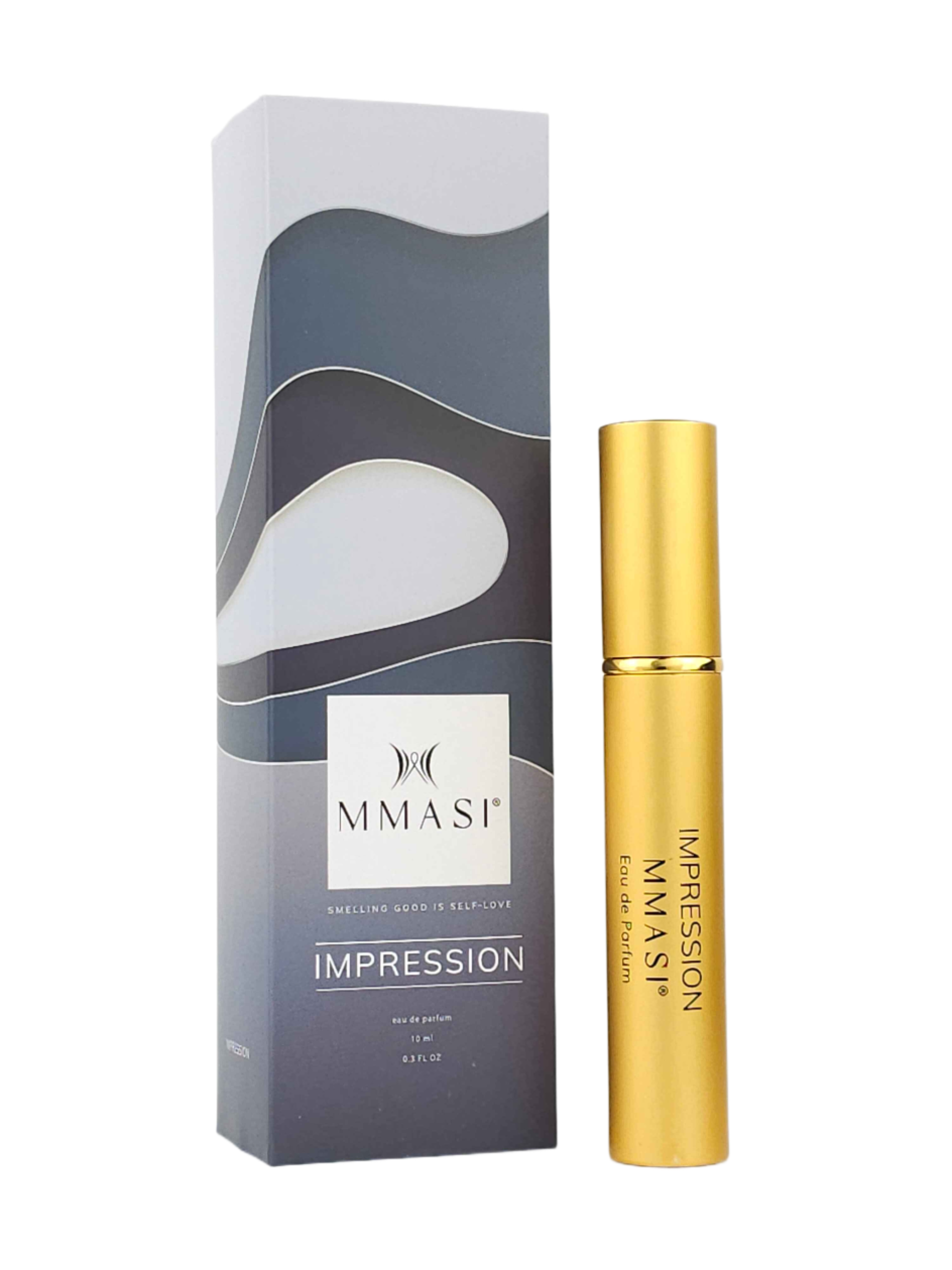 A gold-colored perfume roller bottle labeled "IMPRESSION MMASI Eau de Parfum" placed next to its blue and white packaging box with the brand name "MMASI" and tagline "Smelling good is self-love".